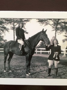 Mom (standing) and Auntie Bliss on one of their school horses at Arlington Hall after a show.